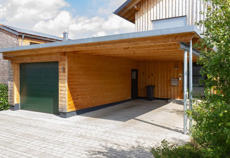 wooden and modern carport in south germany bavarian village area